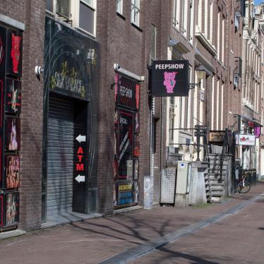 The narrow streets and alleys of Amsterdam's famed Red Light District, normally packed with tourists, seen largely deserted, March 16, 2020.